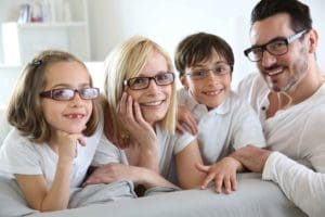 Family who are wearing glasses